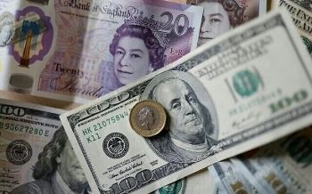 البورصة البريطانية تغلق على ارتفاع والإسترليني ينخفض